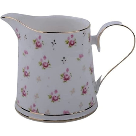 White porcelain pitcher with little pink roses on it. 