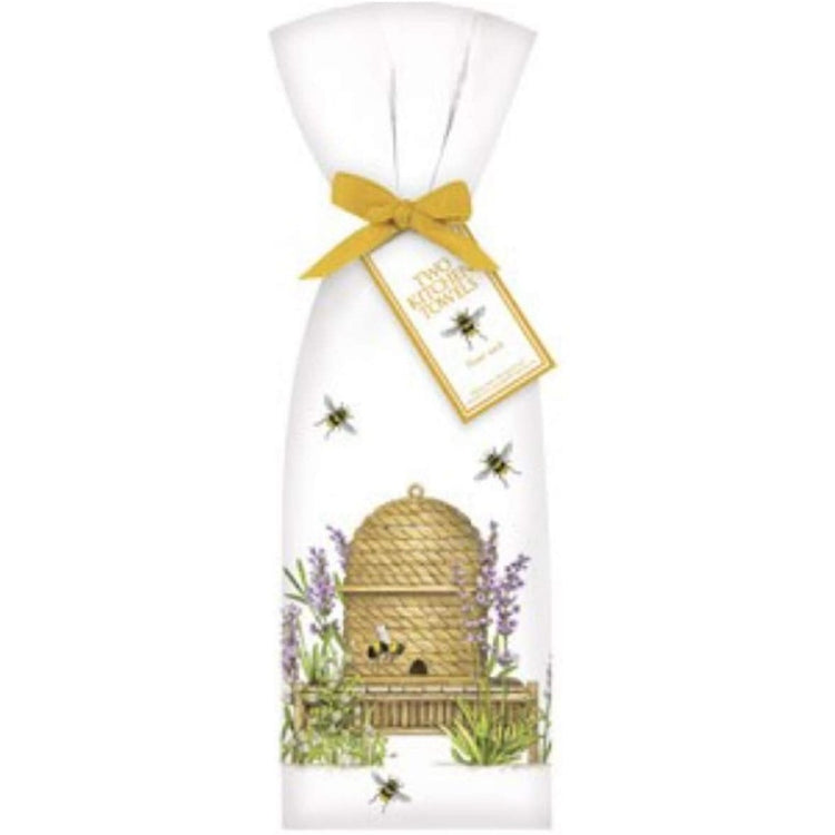 Beehive with lavender around it & bees.