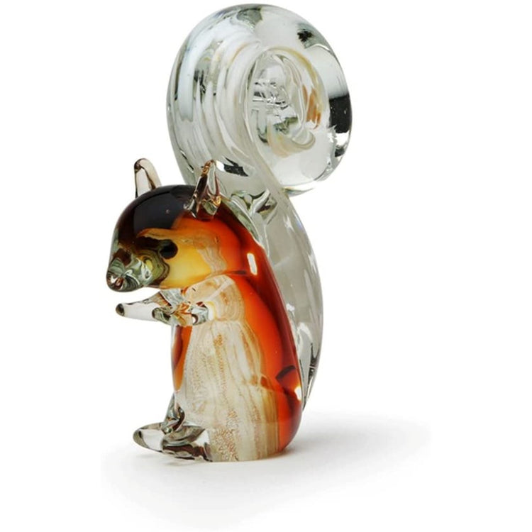 Clear glass squirrel with brown, tan & black accents inside of it.