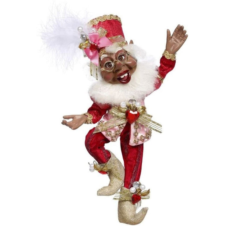 African American bearded elf in red suit and hat with pink vest and heart accents.
