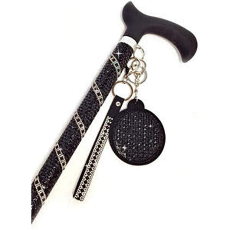 Black handle cane with black rhinestones with swirled silver rhinestones along the cane.