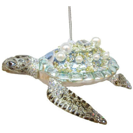 Light blue and green sea turtle embellished with sparkles and pearls.