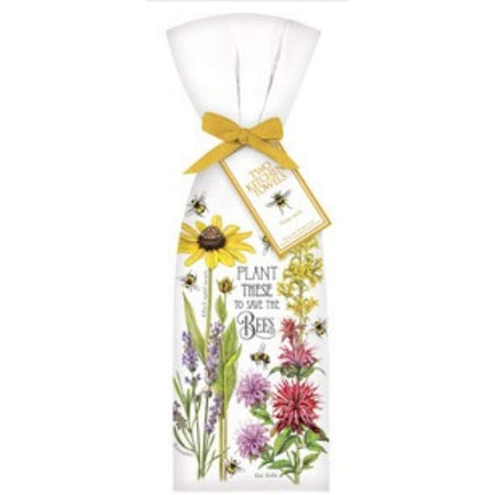 "Plant these to save the bees" on a towel with flowers.