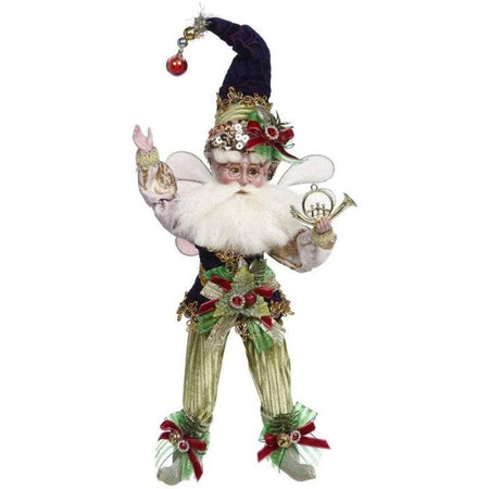 White bearded fairy with a gold & green outfit & a purple hat on.