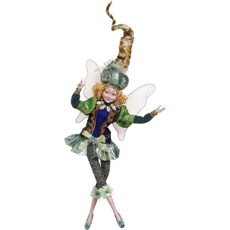 fairy woman with a peacock colored outfit & hat on