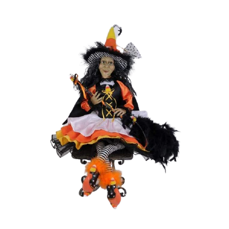 Black haired witch with a candy corn inspired dress on.