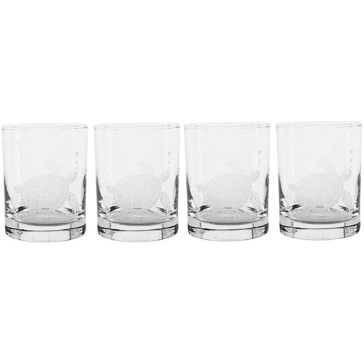 4 clear glasses with a sea turtle etched in see-through white