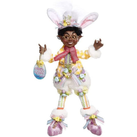 African American elfin boy in bunny ears, yellow plaid top and holding an egg shaped sign that says "happy easter"