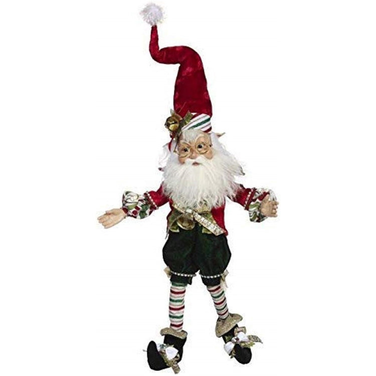 Elf figure wearing red, white and green candy cane stripes and red hat.
