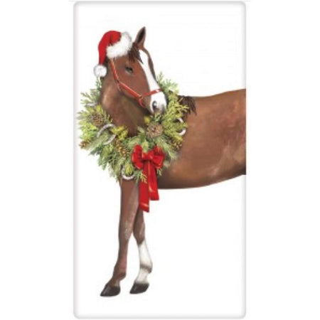 Brown horse wearing a Santa hat & wreath around its neck with a red bow.