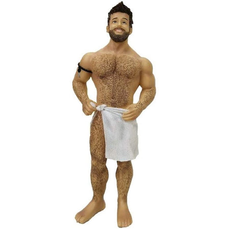 Burly hairy man wearing a towel around his waist.  Figurine ornament.