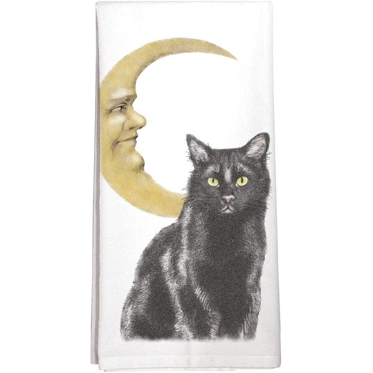 white towel with a black cat and yellow crescent moon with face.
