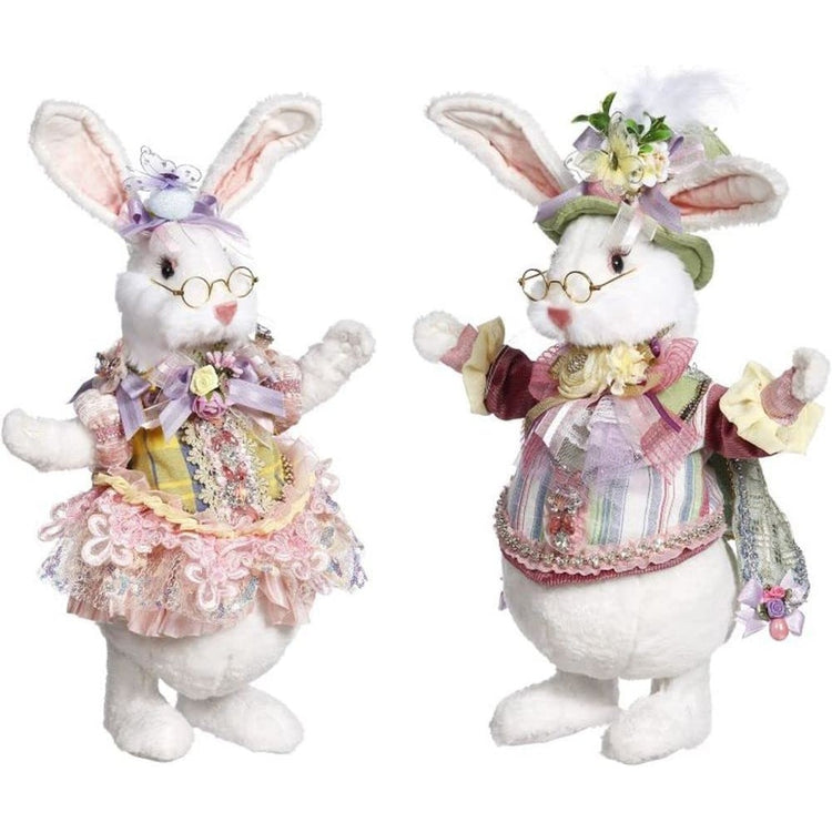 Girl Rabbit and man rabbit wearing easter outfits.