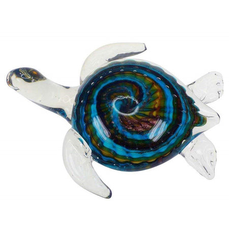 Clear sea turtle figure with swirls of blue green and gold under.