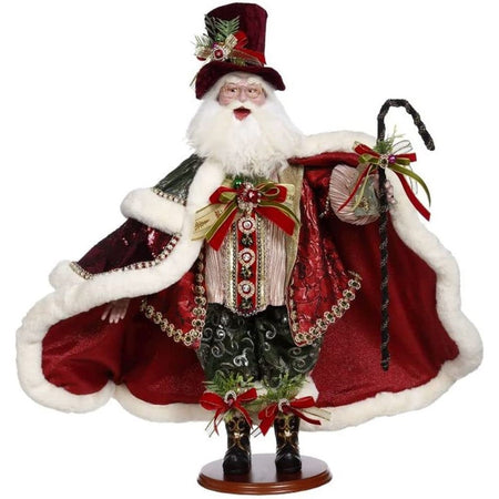 Santa wearing dark red top hat, red velvet cape, and holding black and gold cane