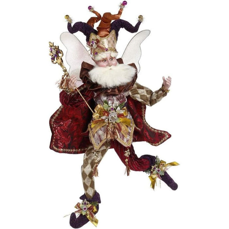 Bearded fairy in dark red cape, gold diamond patterned suit with gold and brown jester hat and scepter.