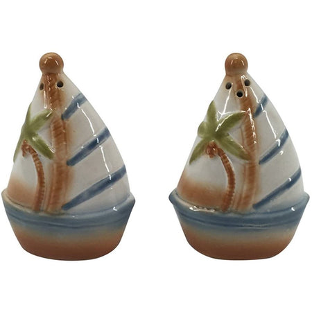 set of two sailboat shaped salt and pepper shakers, sailboat has blue stripes and palm tree