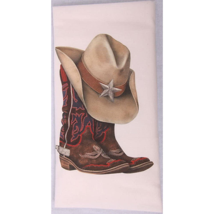 Cowgirl boots with a Stetson hat sitting on top.