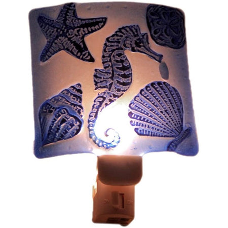 Blue night light with darker shells, starfish & seahorse.