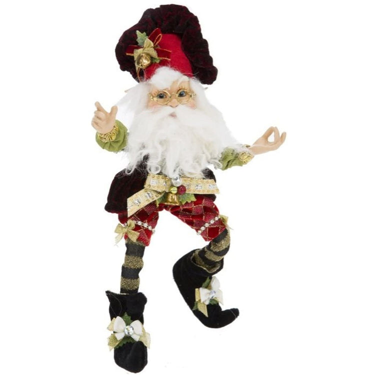 Bearded elf with christmas outfit and red bakers hat on. He has bells on his hat & clothes.