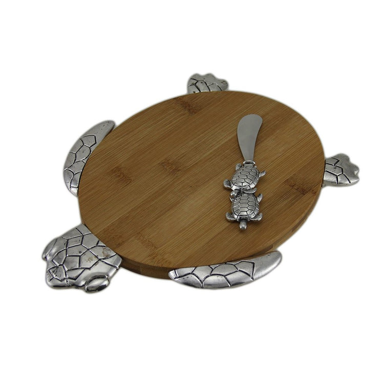 Oval Shaped wood cutting board with attached metal icons to create a sea turtle shape.  Double sea turtle spreader.
