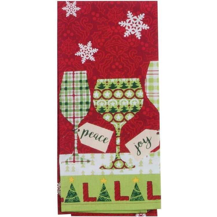 Red patterned towel with white snowflakes and green pattern wine glass design. Says fa la la on bottom edge.