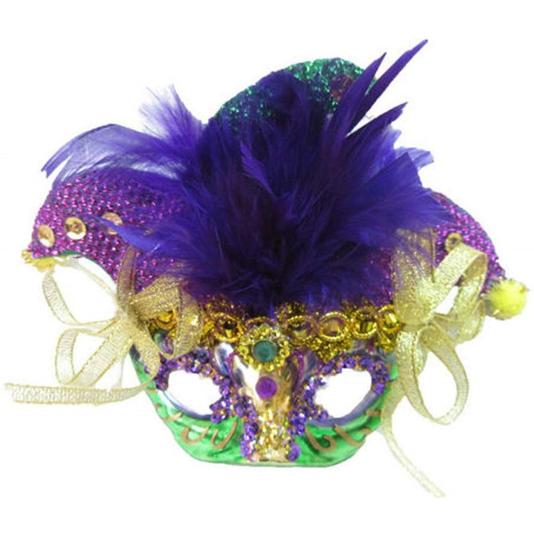 Mardi Gras adorned face mask shaped hanging ornament. Sades of purple and green.  Gold ribbon.