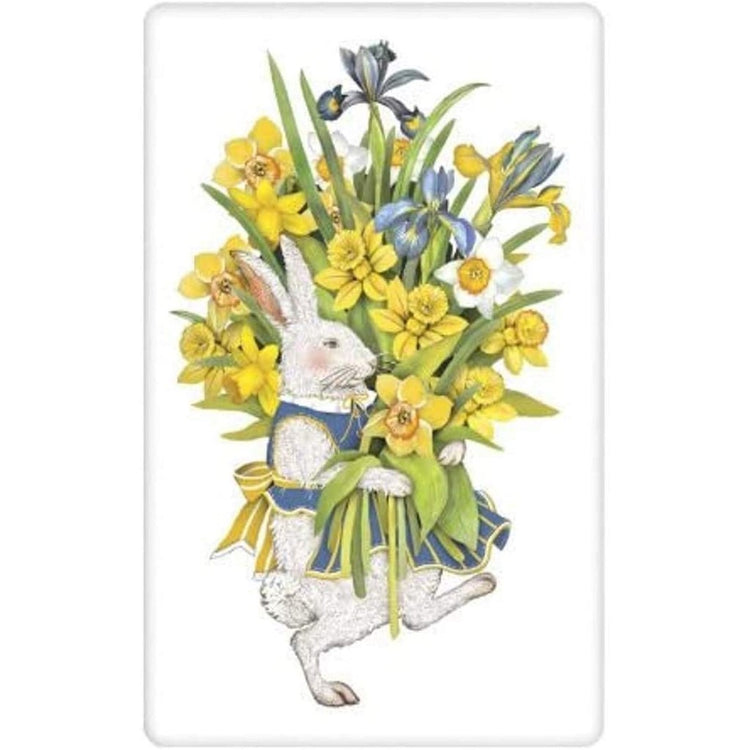 white towel showing a white rabbit in blue apron, blue white and yellow flowers.