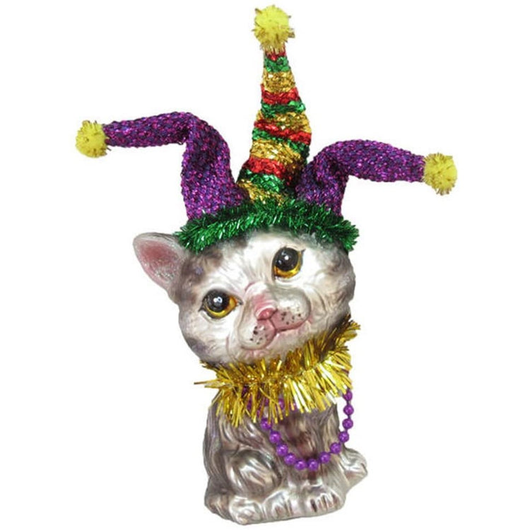 Grey tabby cat with a gold, purple & green hat & beads.