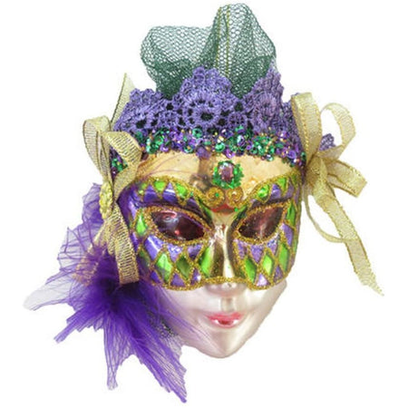 Mardi Gras mask with feathers, gems & tulle embellishments.