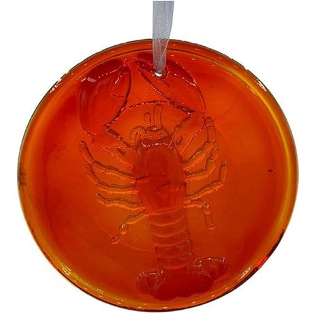 Red glass suncatcher, round with lobster shaped design.