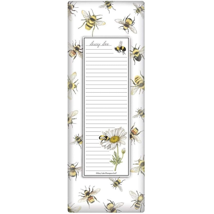 long rectangular notepad with bee design, wrapped in a towel with a scattered bee design.