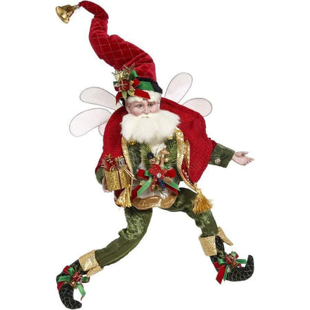 Bearded fairy in long red stocking cap, green pants with nutcracker and spruce needle accents.
