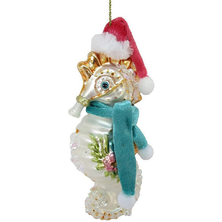 Seahorse embellished with glitter. Wearing a hat & scarf.