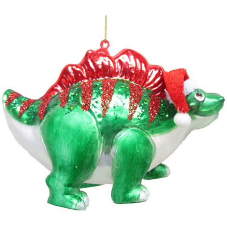blown glass green dinosaur with red glitter spikes and a santa hat