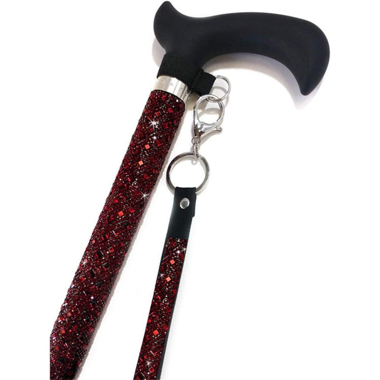 Black cane with deep red circle & square shaped gems.