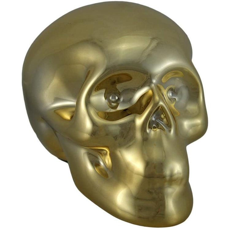 Bank shaped like a human skull with a glossy golden finish