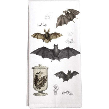 Various bats on a white towel.