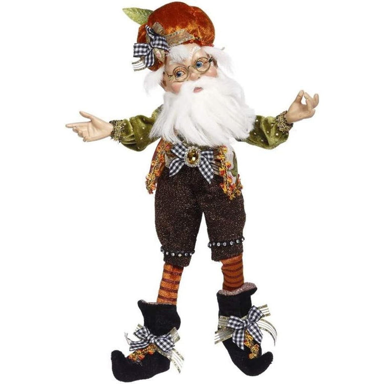 Elf with white beard & fall outfit on.
