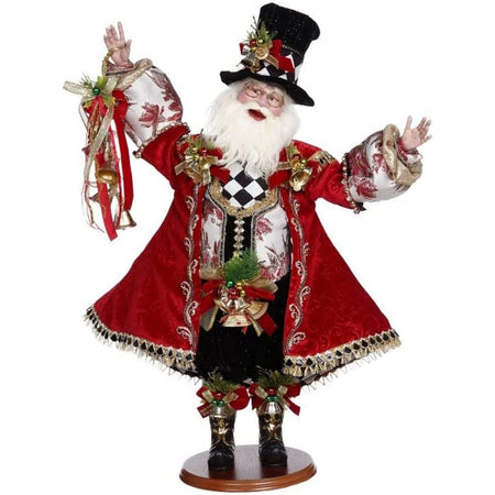 Santa wearing black  top hat and pants, a long red coat and holding ribbons with jingle bells