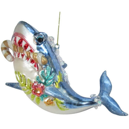 Shark ornament with a candy cane in its mouth.