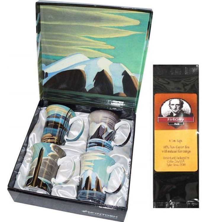 4 mugs in a gift box & a black package of tea bags. Box and mugs all show art by Lawren S. Harris.