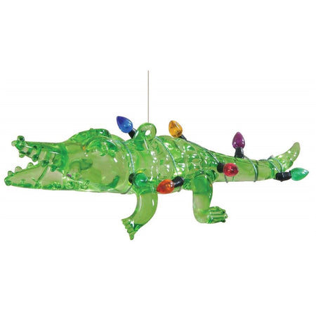 Clear green glass alligator bank wrapped in multi color bulb light string. hanger is on back of alligator.