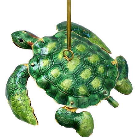 green and yellow metal sea turtle ornament.