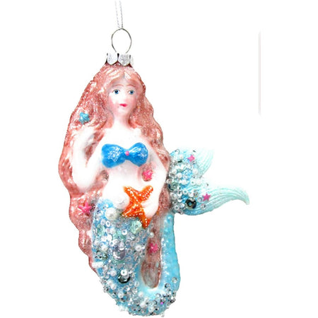 red haired mermaid with a blue tail. 