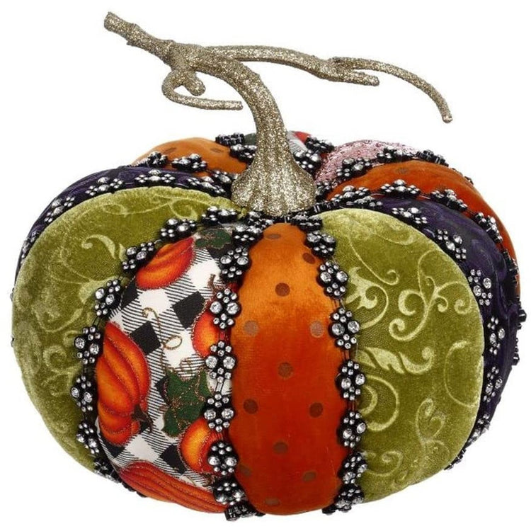 Pumpkin Figurine with green, purple and orange velvet sections along with black and white checkered sections, separated by silver rhinestones.