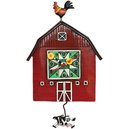Red barn with a rooster on top, and a co pendulum. 