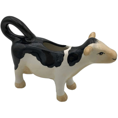 This is a black & white cow shaped creamer. 