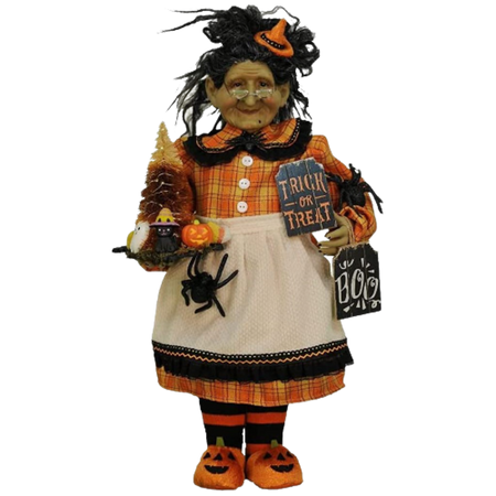 Witch with a orange & yellow plaid dress, pumpkin slipper & Halloween signs.
