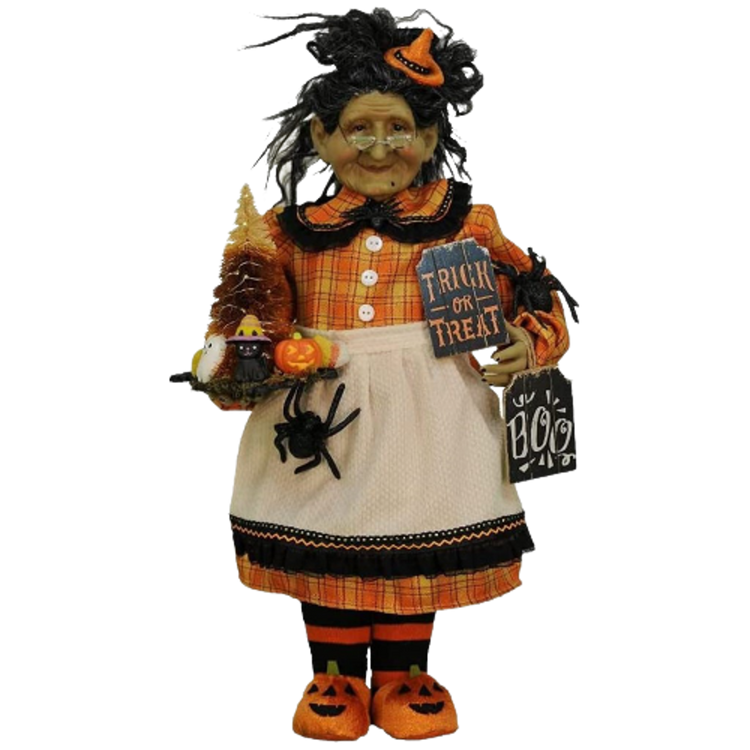 Witch with a orange & yellow plaid dress, pumpkin slipper & Halloween signs.